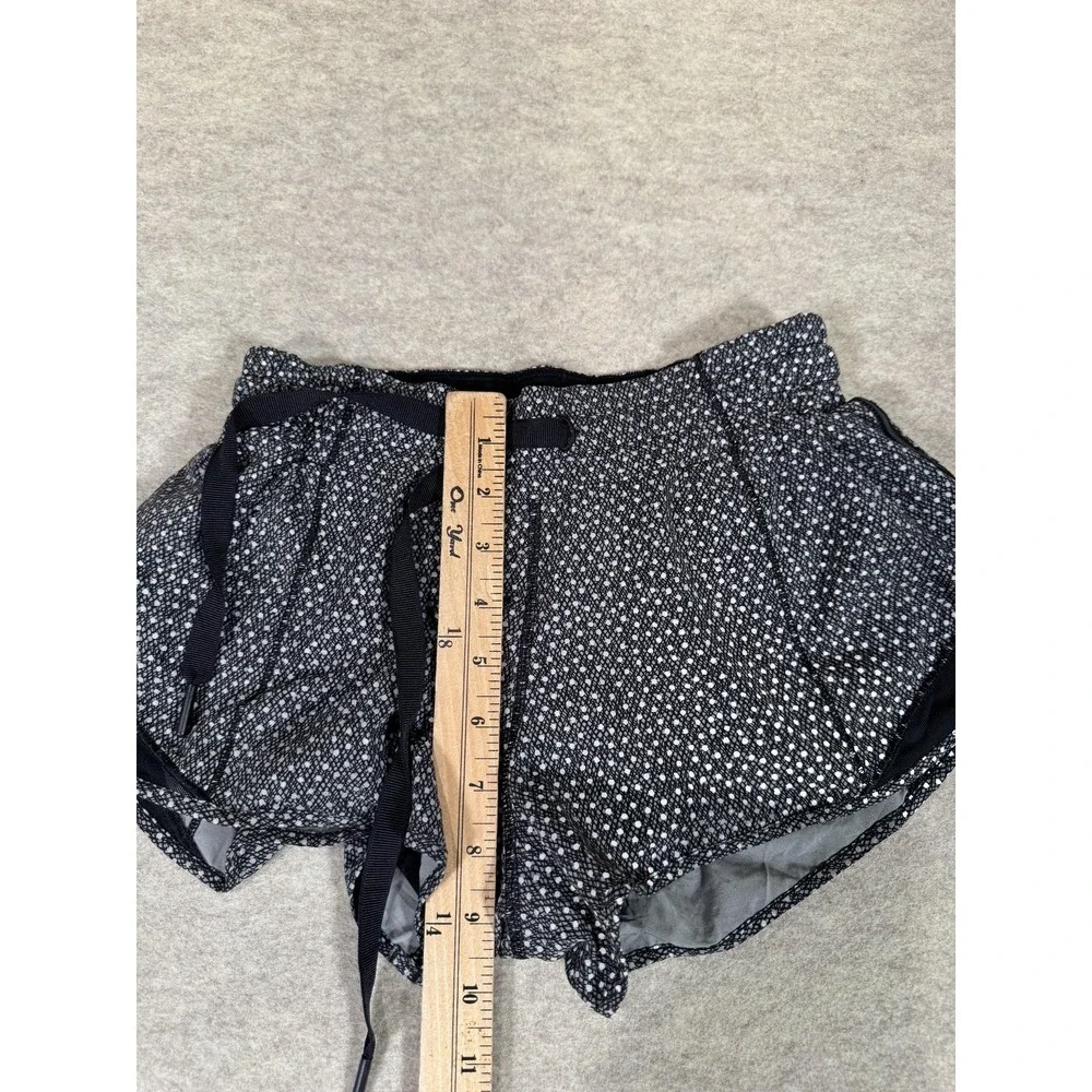 Lululemon Running Shorts Womens 4 Black Lined Zip Pocket Split‎ Hem Athletic